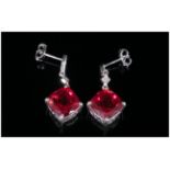 Ruby Colour Quartz and Diamond Drop Earrings, 8.75cts of the ruby red quartz in two cushion cuts,