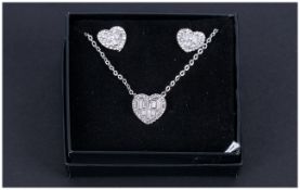 White Austrian Crystal Heart Necklace and Earrings Set, a heart shaped pendant comprising baguette