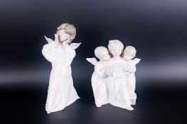 Lladro Figures ( 2 ) In Total. 1. Mime Angel Model Num 4959. Issued 1977, Height 8.5 Inches. 2.