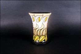 Moorcroft Tubelined Modern Floral Decorated Trial Vase. Date 1999, on cream ground. Stands 8.25