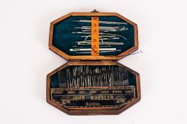 Octagonal Wooden Sewing Needle Box, labelled to the interior 'John Wheeler, London', lined with teal