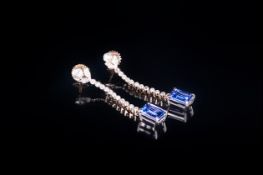 AAA Tanzanite and Diamond Drop Earrings, each earring comprising an octagon cut solitaire of rich