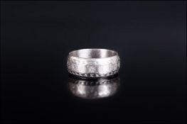 18ct White Gold Band or Wedding Ring with hand incised decoration; full 18ct hallmark; approximate