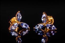 Tanzanite Marquise Cut Stud Earrings, each comprising three marquise cut tanzanites, the single