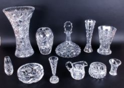 Collection of Cut Glass Items comprising large flower vase 15 inches high, two smaller vases 8