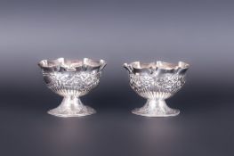 Victorian Pair of Silver Embossed Footed Salts. Hallmark London 1899. Each 1.5 Inches High.