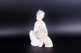 Lladro Figure ' Boy with Dog ' Model Num. 4522. Issued 1970. Height 7.5 Inches, Mint Condition.