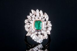 Art Deco 18ct White Gold Set Emerald & Diamond Cluster Ring, the central emerald surrounded by