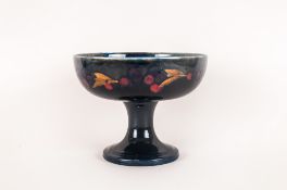 William Moorcroft Signed Pedestal Bowl 'Pomegrantate' and berries pattern. Circ 1920's. Height 6.