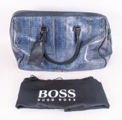 Hugo Boss Designer Genuine Snake Skin Travel Bag with original protective cover. As new condition.