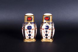 Royal Crown Derby Imari Patterned Pair of Salt and Pepper Pots. Pattern Num 1128. Date 1991. Plastic