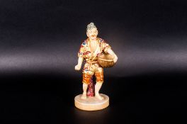 Meiji Period Satsuma Figure Depicting A Farmer Sowing Seeds, Painted In Enamels, 5 ½