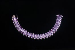Ladies Silver Set Amethyst Bracelet set with 52 faceted amethyst of good colour. 7.75'' in length,