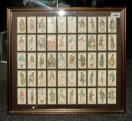 Framed Set of 50 Period Characters From Dickens Cigarette Cards Issued by John Player & Sons. In