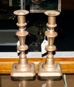 A Pair Of Brass Candlesticks, Height 8 Inches