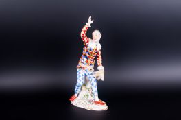 Meissen Porcelain Figure of Harlequin ' Commedia Dell Arte ' Painted In Enamels and Gilt. Modelled