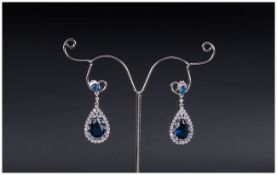 Pair of Faux Sapphire and Diamond Drop Earrings, set in silver, with rhodium plating, good