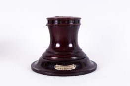 A Mahogany Large & Impressive Inkwell In The Form Of A Capstan with silver mounts. Circa 1920's.