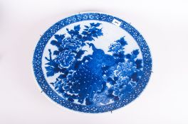 19thC Large Blue And White Oriental Charger Depicting A Peacock Amongst Foliage, 18 Inch Diameter