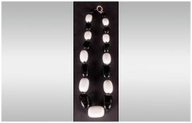 Monochrome Agate Large Stone Necklace comprising alternate, graduated, whlte and black agate, cuboid