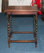 A Small 1920's Oak Occasional Side Table with barley twist and turned legs. Stands 28.5 inches