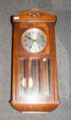 1930's Oak Cased German Box Clock with a round steel dial, 8 day movement with a glazed door front.