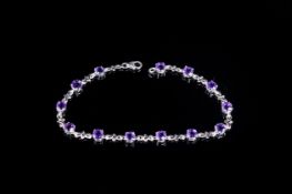 Amethyst Line Bracelet, round cut purple amethysts interspaced with a twist on an infinity symbol,