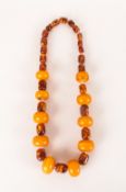 Amber Two Tone Large Bead Necklace comprising ten substantial butterscotch amber antique