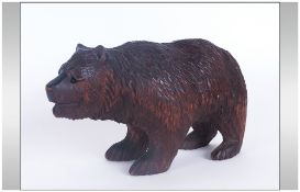 A Carved Black Forest Bear. 6.5 Inches In Length, With Bead Eyes.
