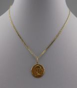 A 9ct Gold Chain and Medallion. Marked 9ct. 14 Inches In Length. 5.2 grams. As New Condition.