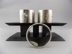 A Pair of English Silver Napkin Holders. Hallmark London 1923, 59.