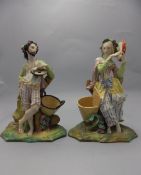 A Fine Pair of German 19th Century Hand Painted Bisque Figures holding a lute and tambourine.