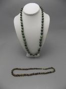 Malachite Graduated Ladies Necklace 140.2 grammes. 24 inches in length.
