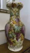 A Large Ceramic Grapes Decorated Floor Standing Vase. c.1920's. Standing 30 Inches High.