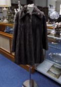 Ladies Mink Three Quarter Length Coat full lined with slit pockets,