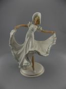 German Berlin Porcelain Figurine. c.1950's. Young Woman, Dancing Wearing a Hat and Long Dress. 10.