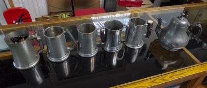 5 Pewter Tankards Together With A Pewter Teapot