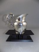 Swedish Early 19th Century Helmet Shaped Silver Milk Jug with Very Stylish Handle and Half Ribbed