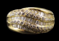 14 Carat Gold Set Baguette and Brilliant cut Diamond and Channel Set Cluster Ring comprises three