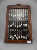 Glass Fronted Wall Display Cabinet Holding 30 Souvenir Spoons, Odd Silver.