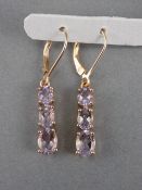 Rose de France Amethyst Triple Drop Earrings, each earring having three graduated,