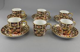 Royal Crown Derby Imari Pattern Set of 6 Coffee Cups and 5 Saucers. Pattern number 2451. Date 1924.