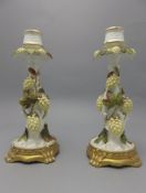 Moore Hand Decorated Pair of Porcelain Candlesticks.