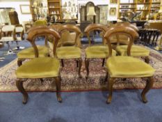 Set of Six Walnut Framed Dining Chairs of solid construction.