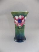 Moorcroft Signed Vase ' Anemone ' Design on Green and Blue Ground. Height 6 Inches.