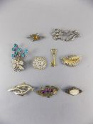 Nine Various Silver Brooches, all marked, including one Continental, some with semi-precious stones