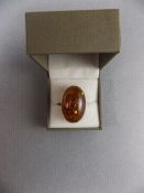 2 Silver Rings,  One Set With A Large Amber Stone,