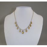 Antique 9ct Gold Necklace Set with 9 Pear Shaped Faceted Citrines of Good Colour and Clarity.