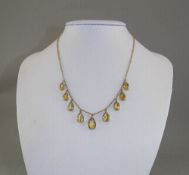 Antique 9ct Gold Necklace Set with 9 Pear Shaped Faceted Citrines of Good Colour and Clarity.