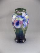 W. Moorcroft Signed Vase ' Orchids and Spring Flowers ' on Green / Blue Ground. c.1930's.